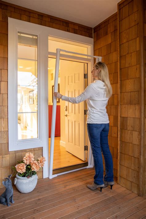 Retractable screens are only as large as your door, and are tucked away discreetly when not in use. . Genius cool retractable screen door